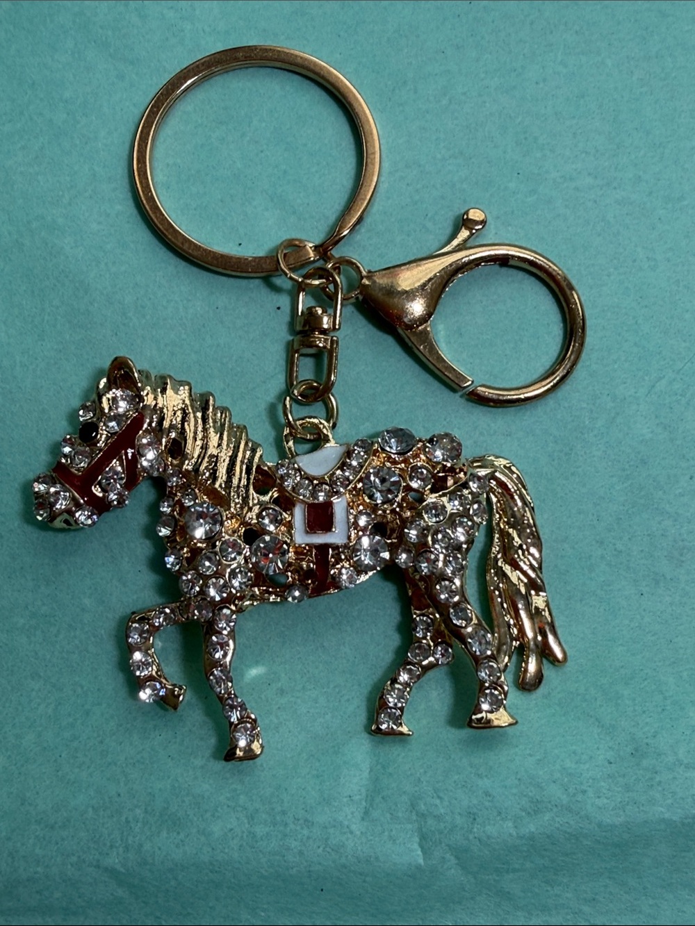 Gold Tone Horse Crystal Keychain - Clear Rhinestones with Red & White